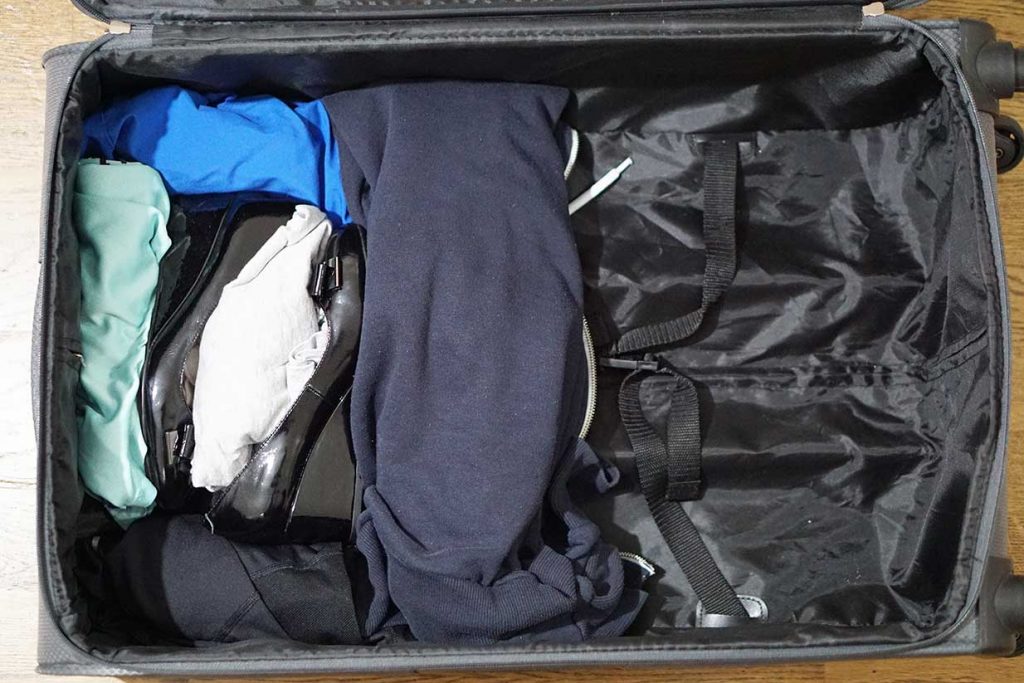 packing wedges in a suitcase
