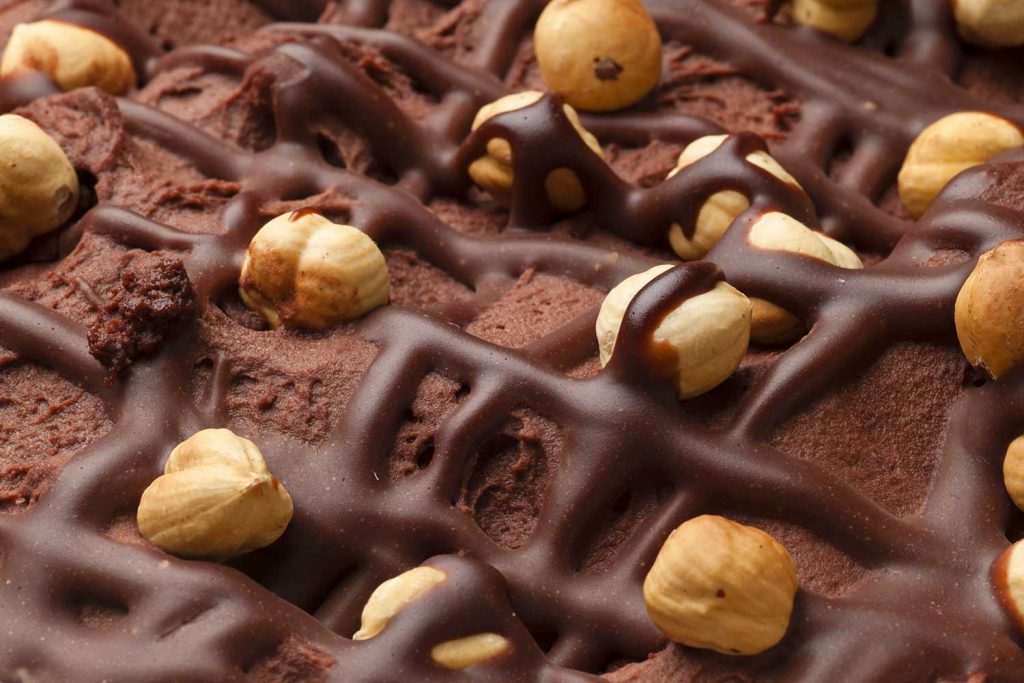 chocolate topped with whole hazelnuts
