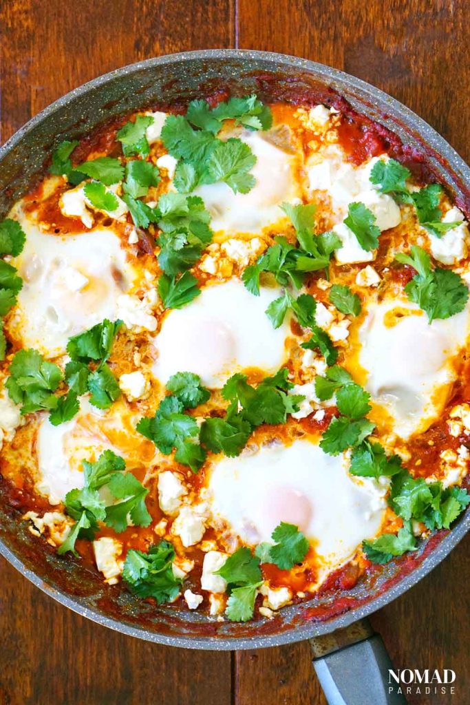 Shakshouka in a pan on a table