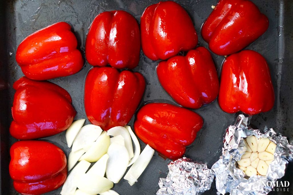 Muhammara recipe step by step (veggies on the tray going in the oven).