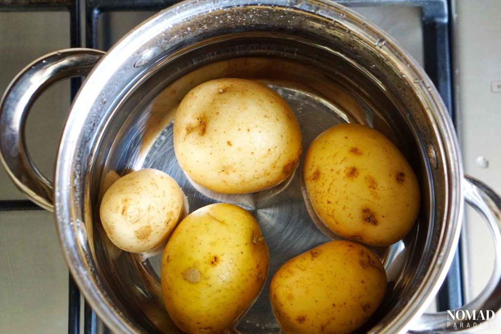 Boiling potatoes for the salad.