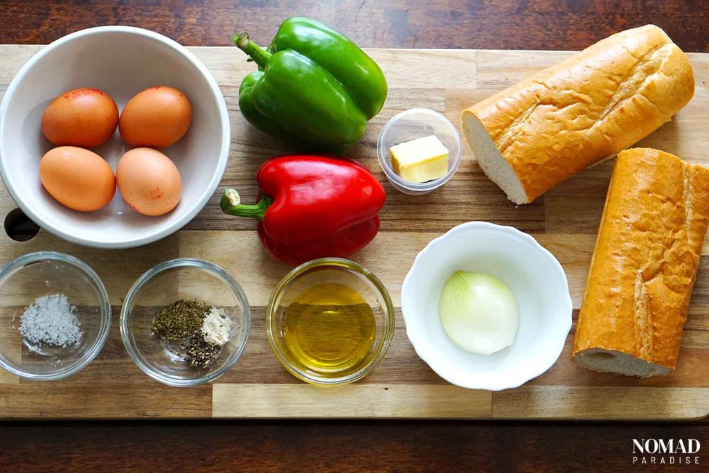 Pepper and Egg Sandwich ingredients arranged on a wooden board
