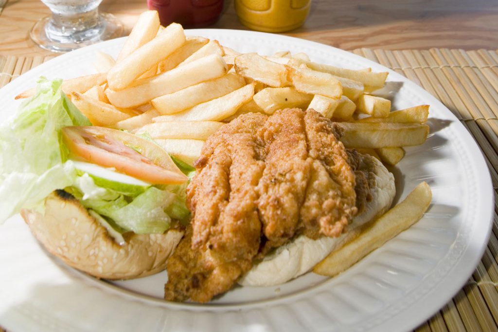 Fish sandwich with fries.