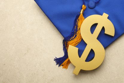 College graduation cap with $ sign for student loan interest 