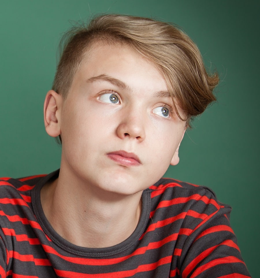 boys long side swept hairstyle with short sides