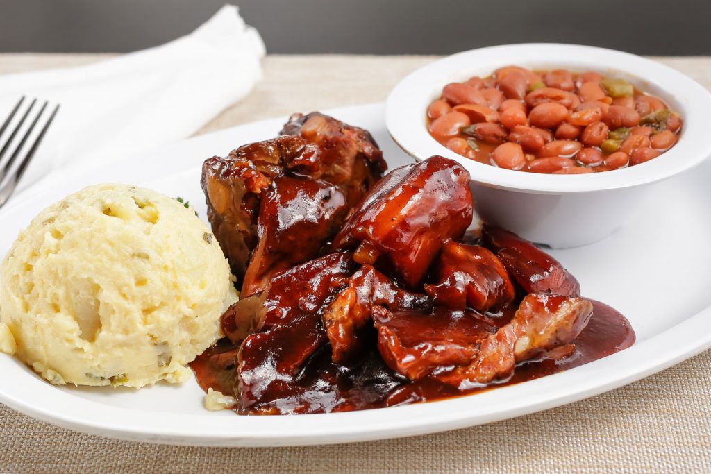 Rib tips with beans and mashed potatoes