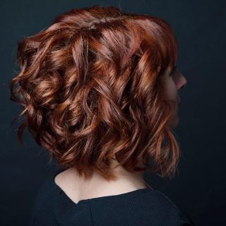 women with curly stacked bob