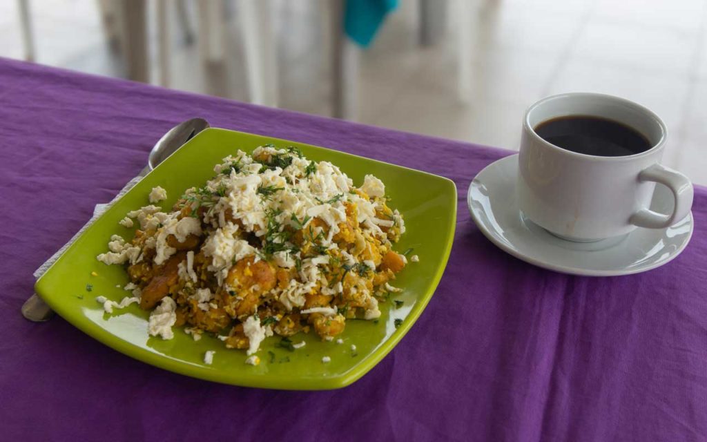 Ecuadorian food: tigrillo (scrambled eggs, green plantain, cheese, and onions)