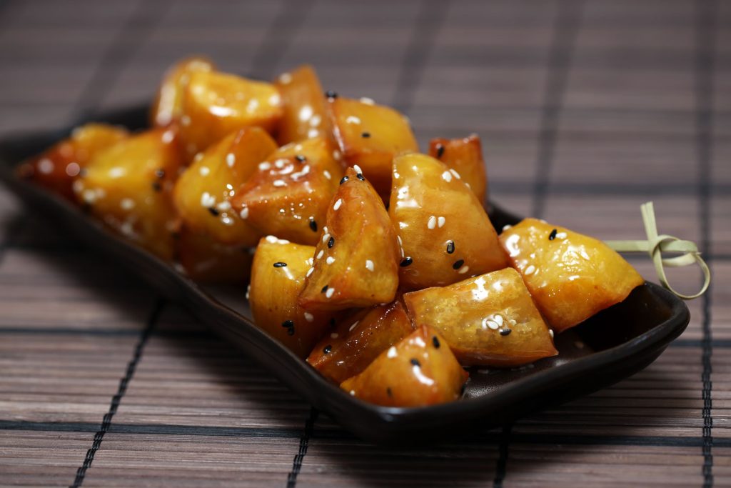 Daigaku Imo (Candied Sweet Potatoes) on a small rectangular plate.