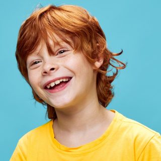 long redhead boy haircut
