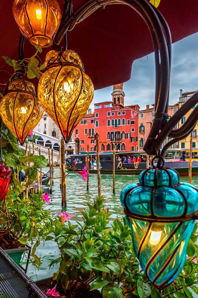 The Grand Canal in Venice and decorative lanterns on the streets.