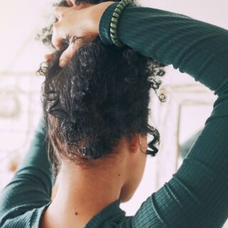 putting my newly permed hair up