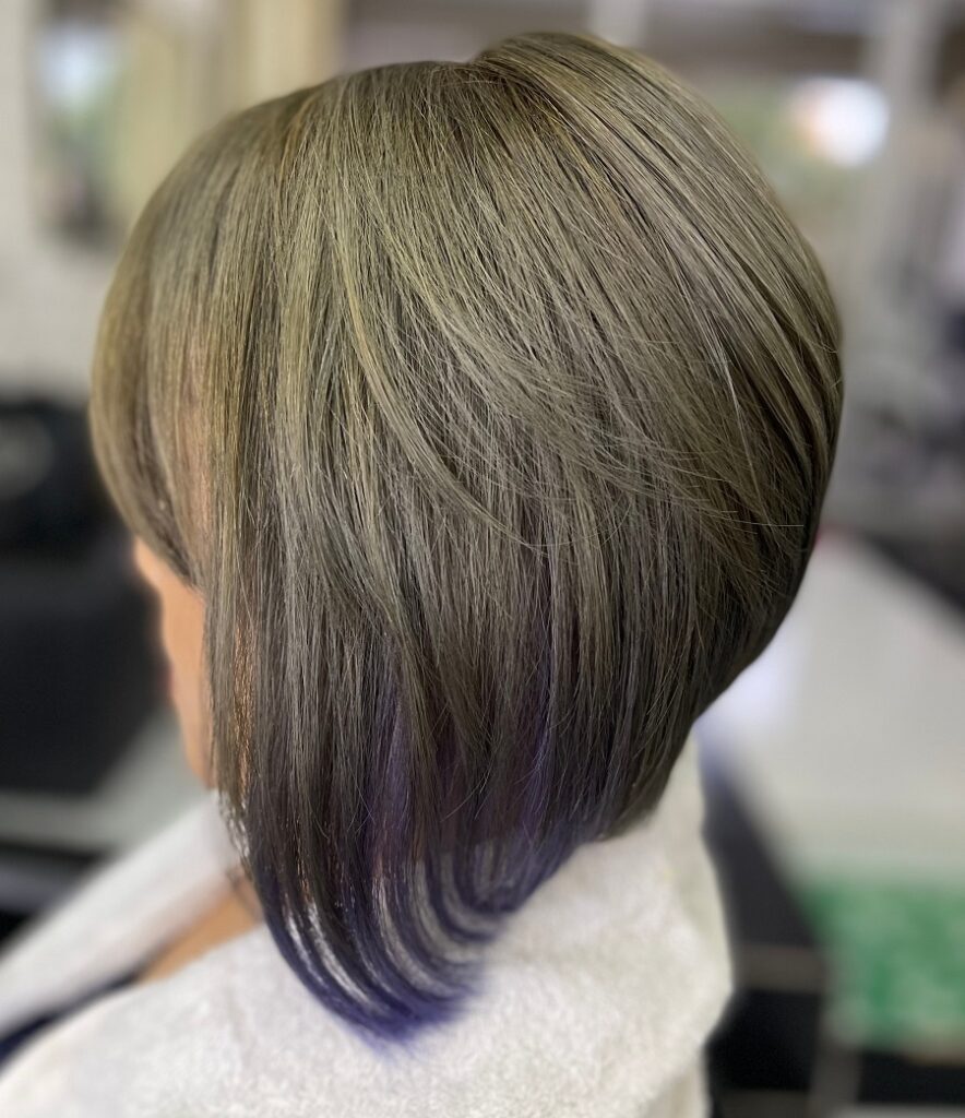 short in back and long in front brunette hair with blue tips
