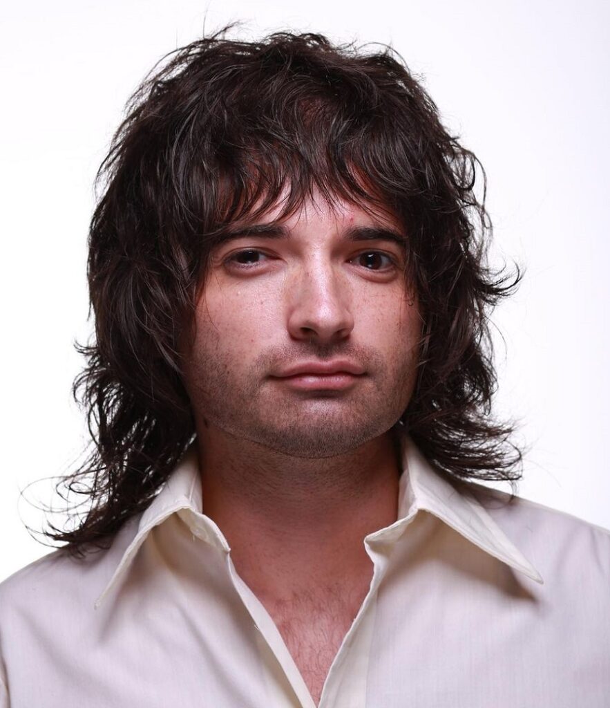 wavy long shag haircut for men