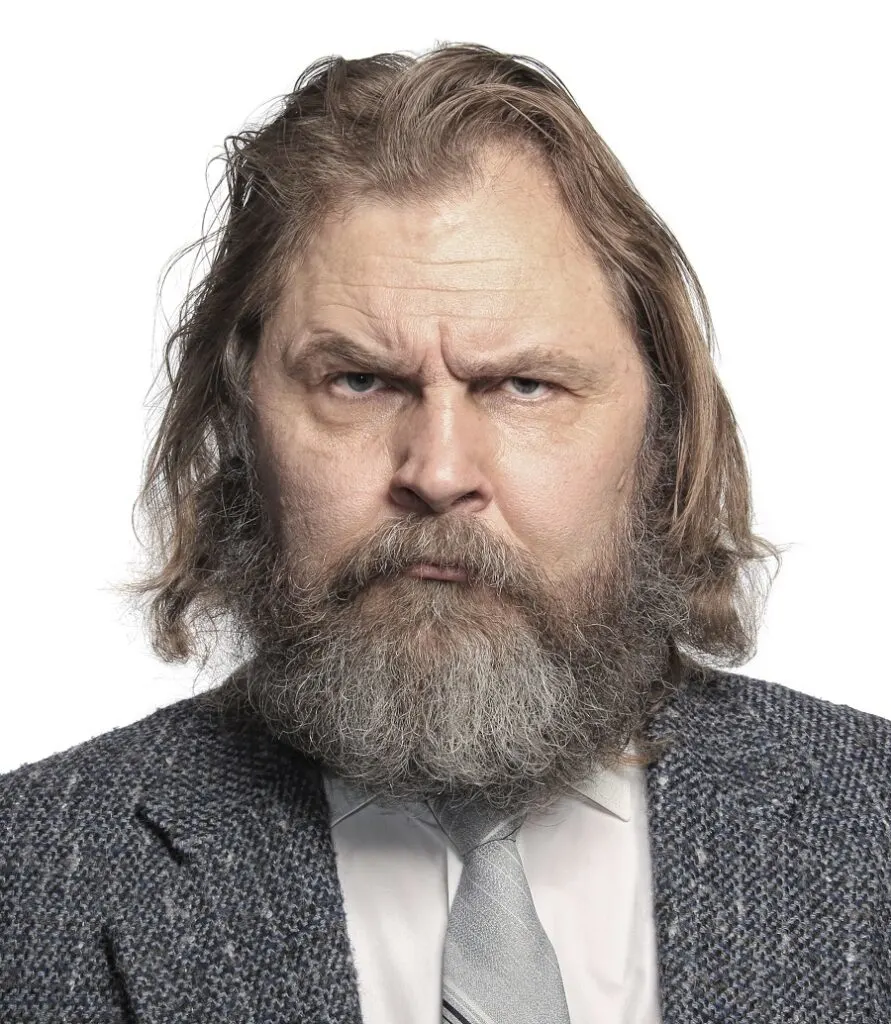 bearded guy with thin wavy long hair