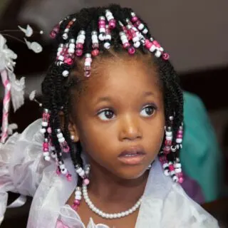 black flower girl hairstyle
