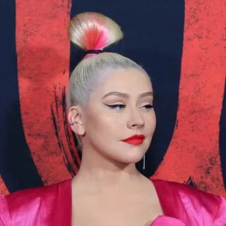 blonde celebrity Christina Aguilera with blue eyes