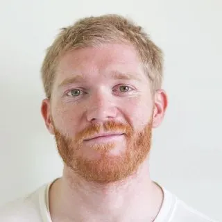 guy with blonde hair and red beard