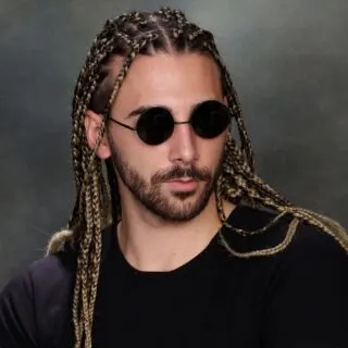 guy with long braids