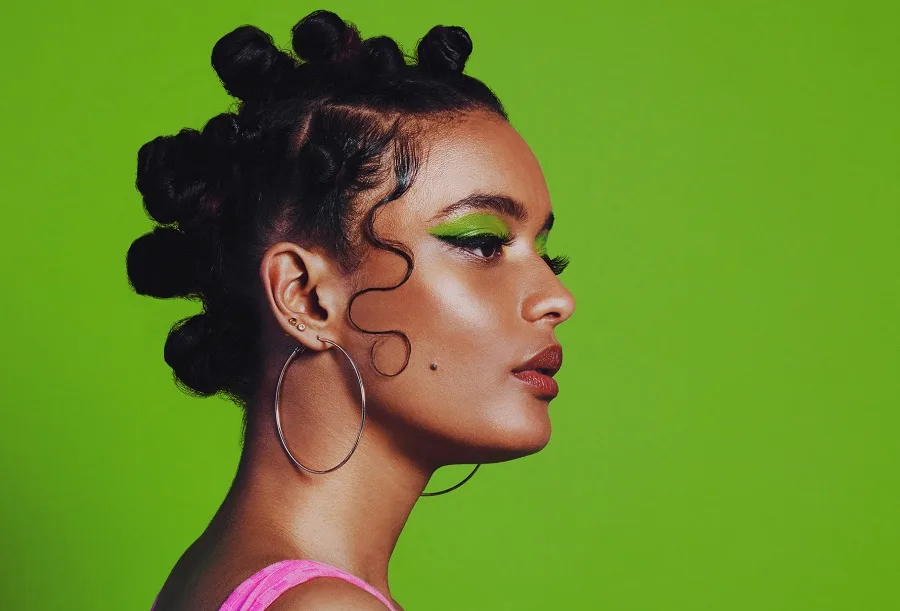 black woman with bantu knots