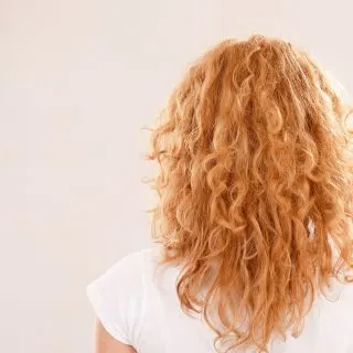 How to Get Rid of a Bad Perm Without Cutting Your Hair