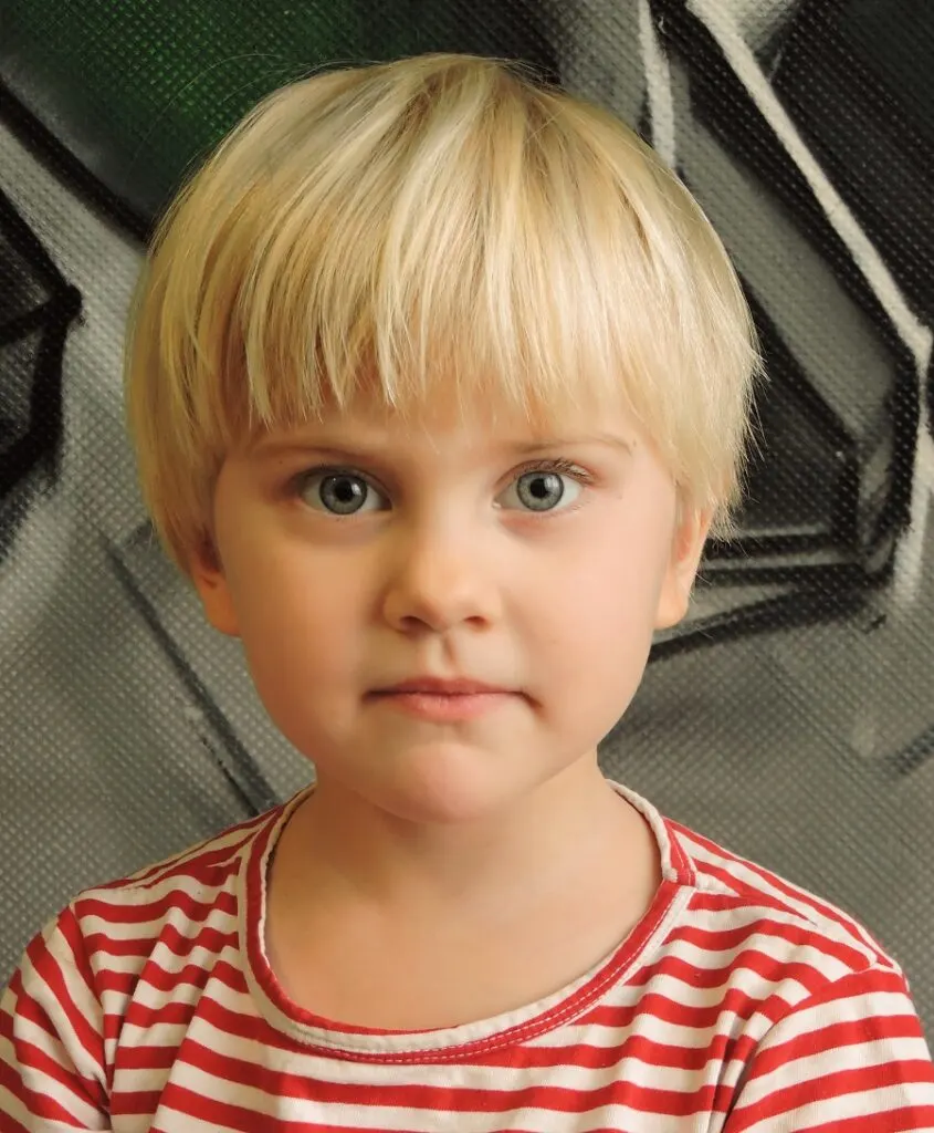 little girl blonde pixie cut with bangs