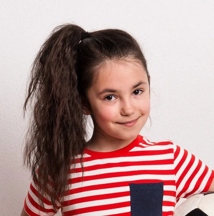 little girl with ponytail