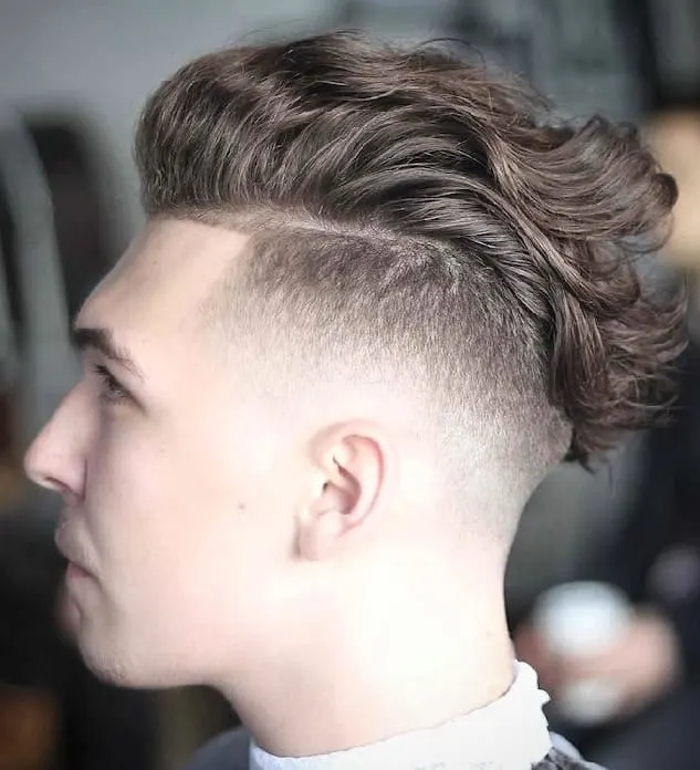 long wavy hair with skin fade