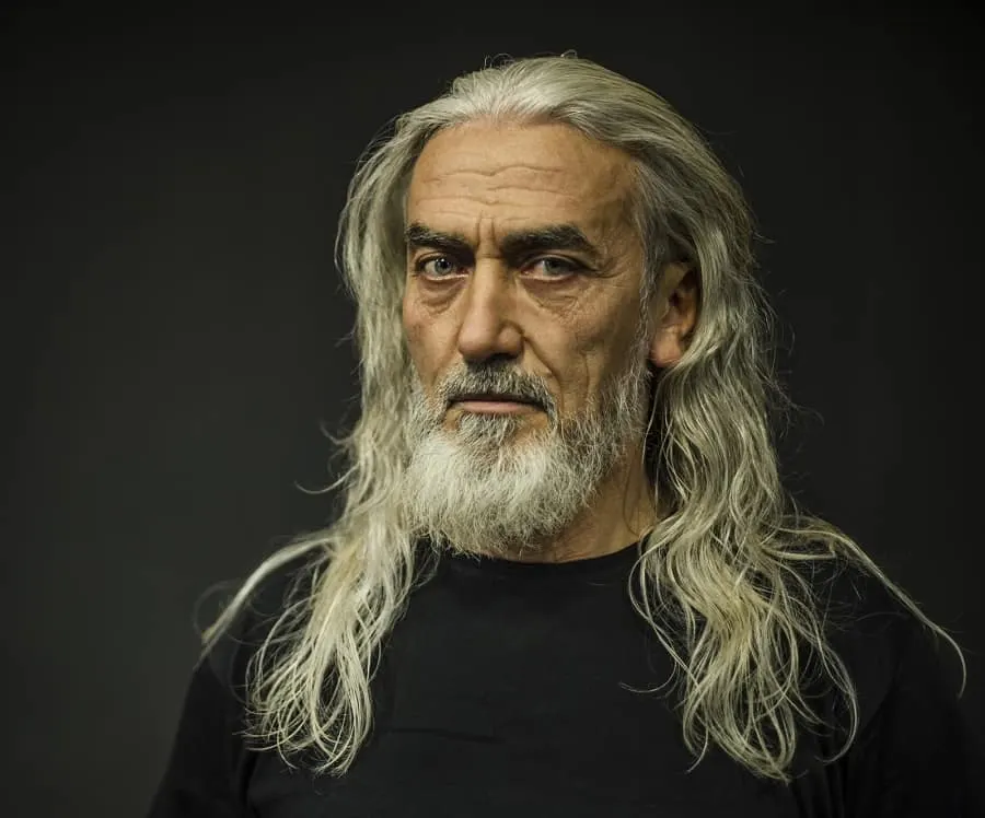 long wavy hairstyle for older men