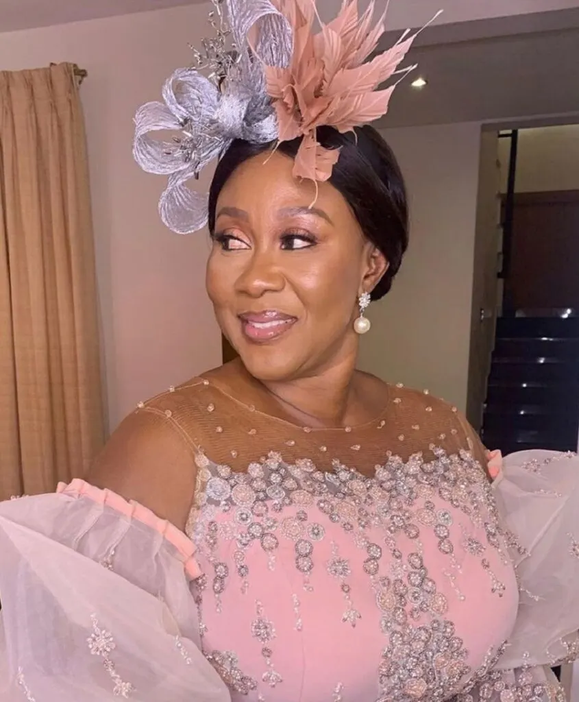 mother of groom hairstyle with fascinator