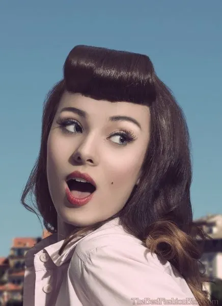 Bangs type: pin-up hairstyle