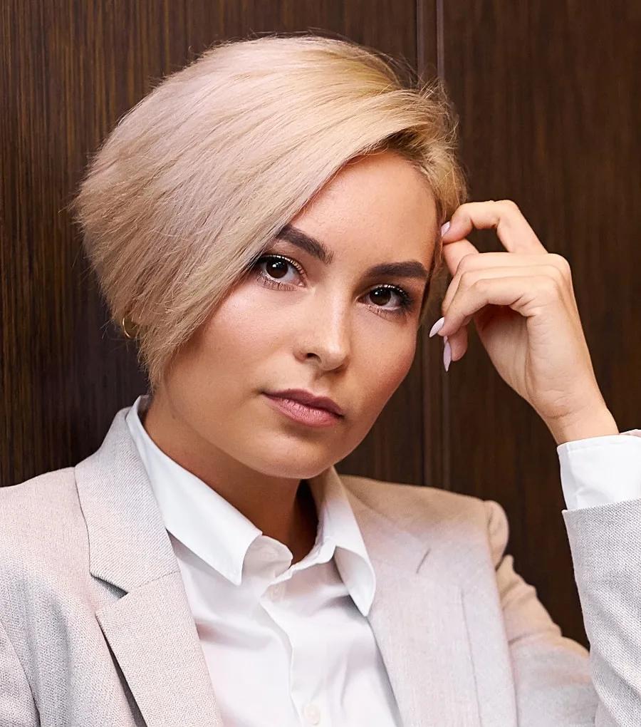 short in back and long in front blonde pixie bob