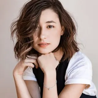 women with wavy hair and bangs