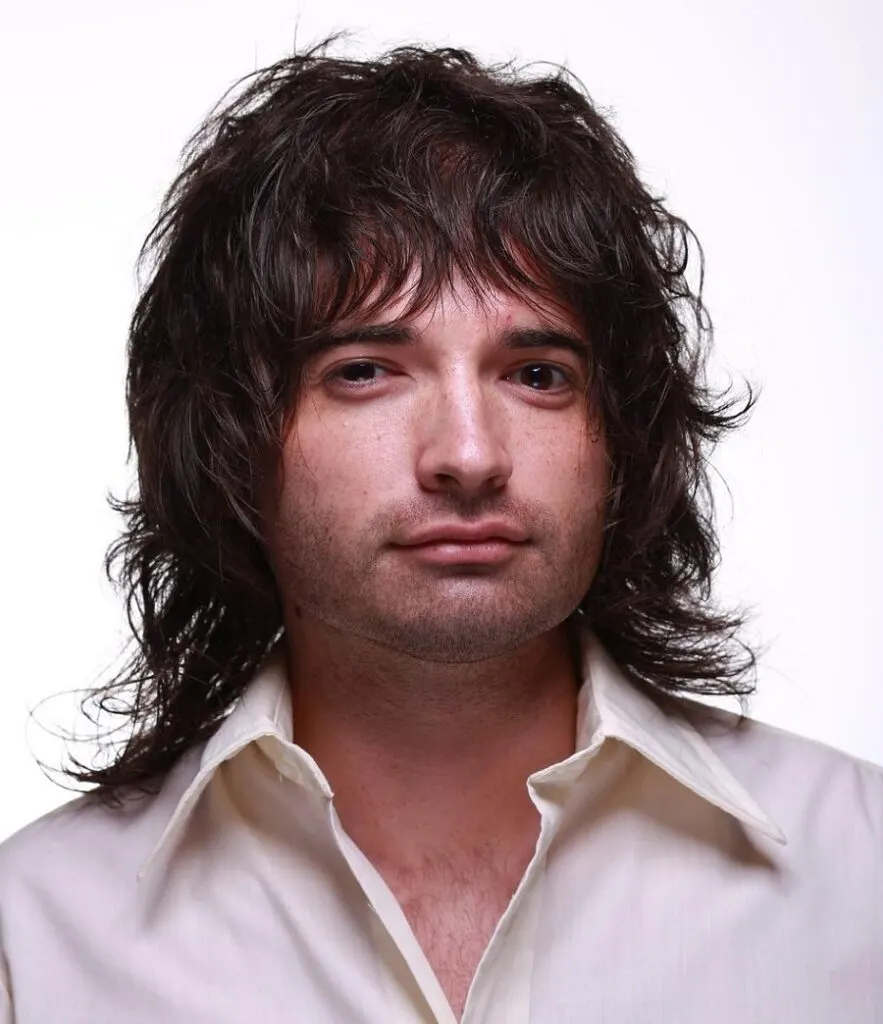 wavy long shag haircut for men